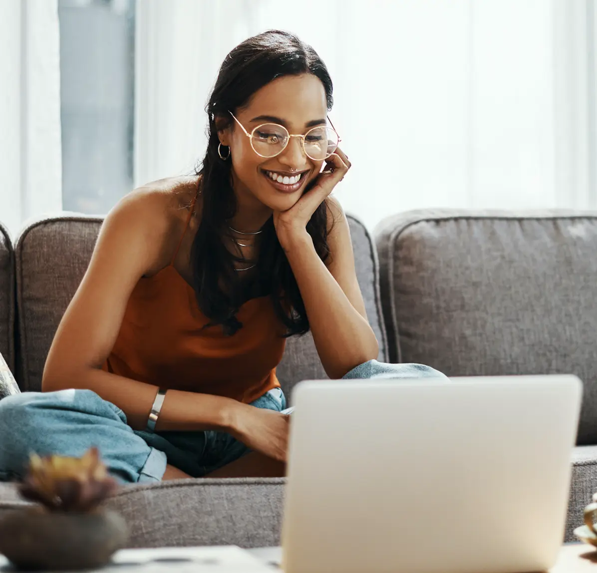 Woman looking at laptop